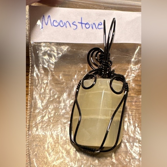 Beautiful Moonstone pendant in a black wrap (jewelers grade wire) - Picture 1 of 16